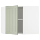 Armoire de cuisine d’angle METOD vert clair ouverte, révélant des étagères.