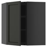 Armoire de cuisine ouverte vert foncé, montrant les étagères.