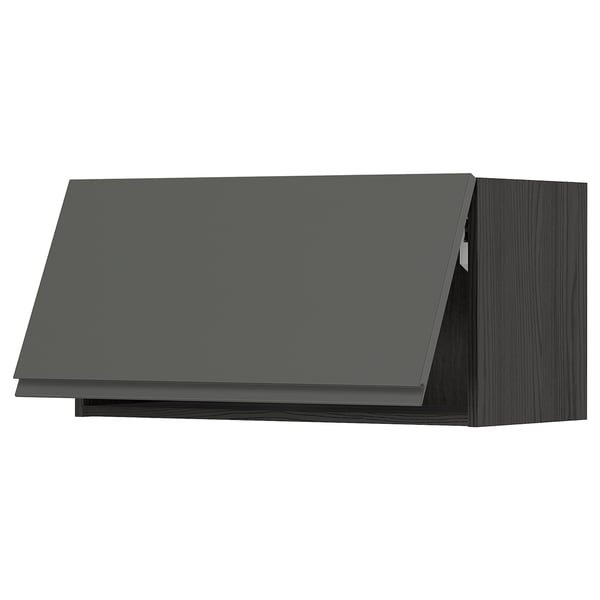 Armoire de cuisine moderne gris foncé avec un design élégant et plat et des poignées minimalistes.