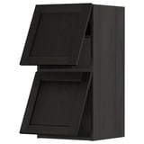 Armoire de cuisine METOD noire, rectangulaire, en bois avec bords biseautés et porte fermée.