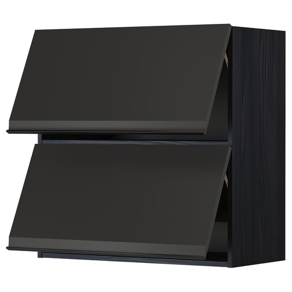 Unité de cuisine noire moderne avec une finition élégante et sombre et un design minimaliste.