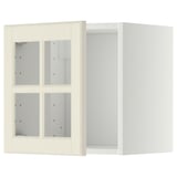 Armoire murale vierge blanc cassé avec portes en verre, forme carrée, bords biseautés, pour le rangement de la cuisine.