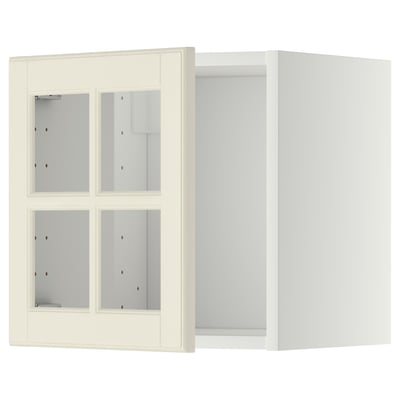 Armoire murale vierge blanc cassé avec portes en verre, forme carrée, bords biseautés, pour le rangement de la cuisine.