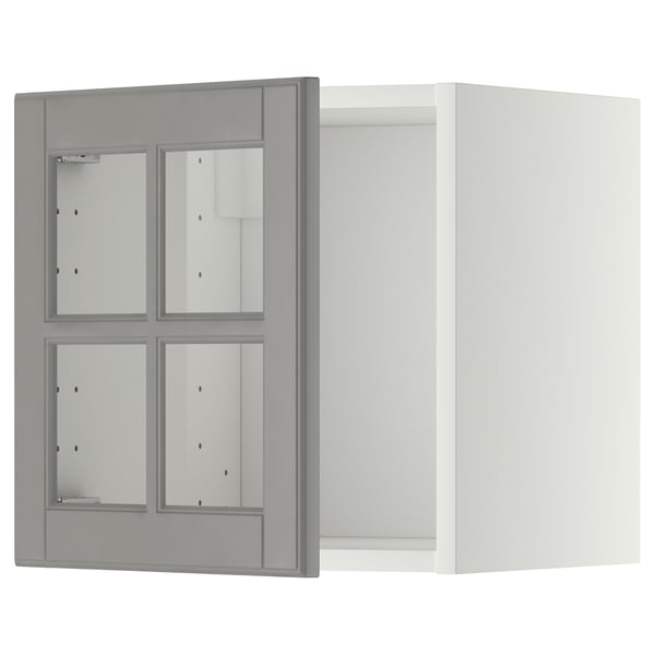 Cette image montre une armoire murale METOD grise avec des portes en verre et des bords biseautés, de forme rectangulaire et de design moderne.