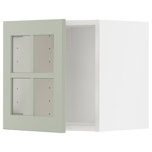 Armoire murale verte METOD avec portes en verre.