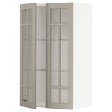 Armoire ouverte à portes vitrées beige de la série ikea METOD, dotée d’étagères réglables et d’un design moderne et minimaliste.