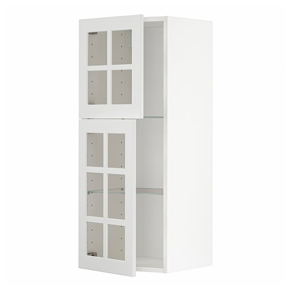 Armoire de cuisine METOD blanche avec portes vitrées et étagère réglable.