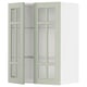 Armoire de cuisine METOD verte avec portes vitrées et étagères réglables.