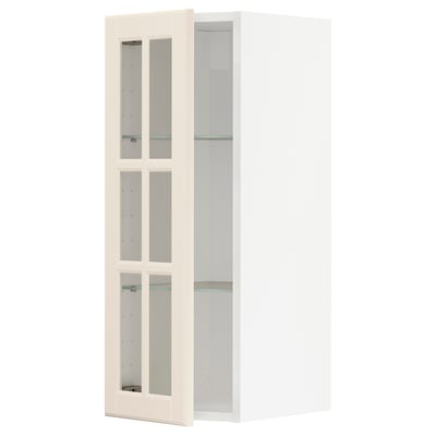 Armoire de cuisine METOD blanc cassé avec portes en verre, bords biseautés, charnières en nickel et étagères en verre.
