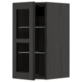 Armoire de cuisine moderne noire METOD avec portes vitrées et étagères réglables.