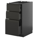 Armoire de cuisine noire moderne avec trois tiroirs ouverts, des poignées élégantes et une finition brillante.