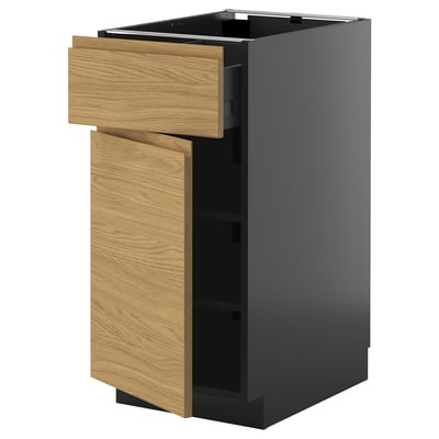 Armoire de cuisine noire moderne avec tiroirs en bois sur fond blanc.
