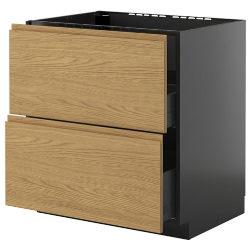 Armoire de cuisine en bois noir et clair avec deux tiroirs.