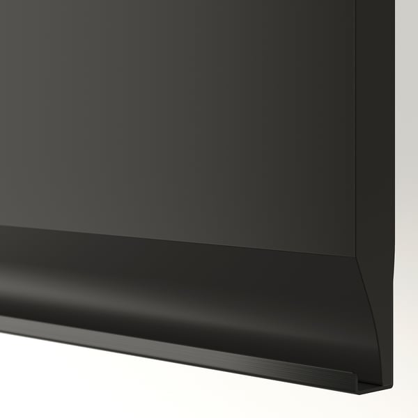 Armoire de cuisine moderne noir mat avec un design élégant et sans poignée et des lignes épurées. Finition de haute qualité, construction robuste.