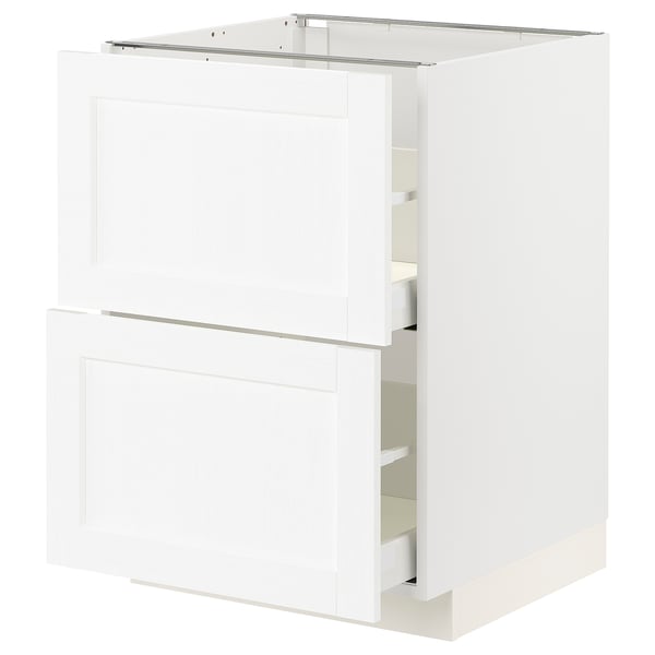 Armoire de cuisine METOD blanche avec une texture de grain de bois, dotée de deux tiroirs et d’une porte, conçue pour une fermeture en douceur et en douceur.