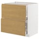 Bloc-tiroirs blanc et chêne, design minimaliste moderne avec poignées intégrées, fabriqué en panneaux de particules et en acier.