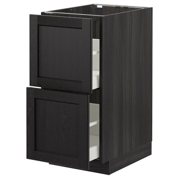 Armoire de cuisine noire avec deux tiroirs ouverts, design élégant, finition moderne.