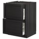 Armoire de cuisine ikea METOD noire avec deux tiroirs ouverts, finition bois foncé.
