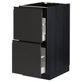 Armoire de cuisine noire moderne avec deux tiroirs et un design élégant et minimaliste.