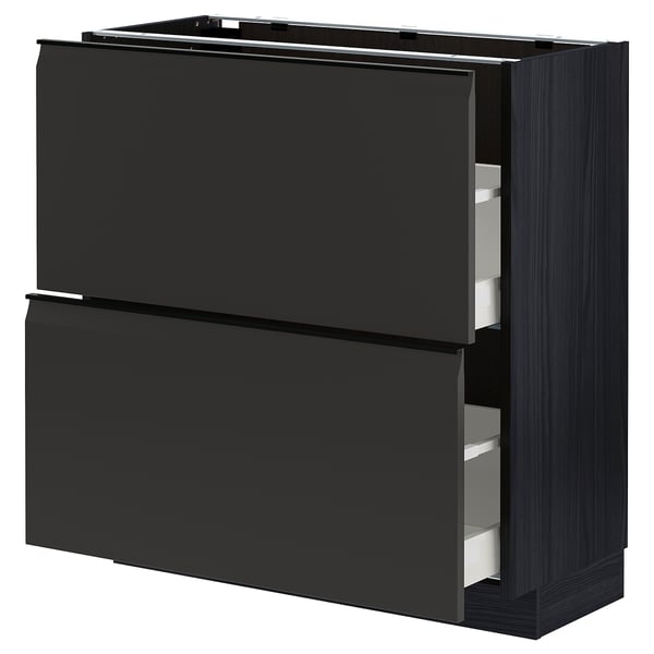 Une armoire de cuisine noire moderne du système METOD, dotée de deux tiroirs.
