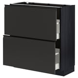 Une armoire de cuisine noire moderne du système METOD, dotée de deux tiroirs.