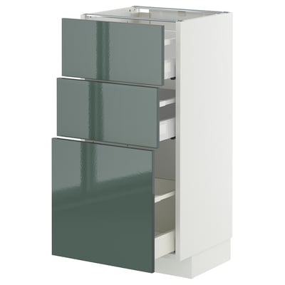 Armoire de cuisine moderne METOD avec façades gris-vert brillant, trois tiroirs lisses.
