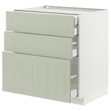 Une armoire de cuisine METOD vert clair avec trois façades de tiroirs lisses et un design élégant et artisanal.