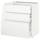 Un meuble de cuisine ikea METOD blanc avec trois tiroirs. Il a un design minimaliste et des surfaces lisses.