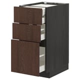 Armoire de cuisine ikea METOD brun foncé avec trois tiroirs en bois partiellement ouverts.
