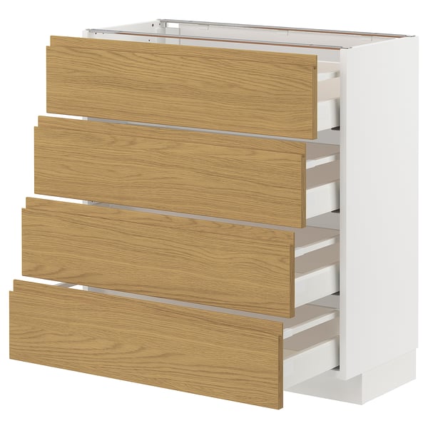 Armoire METOD blanche avec quatre tiroirs en bois, design minimaliste moderne.
