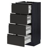Armoire de cuisine moderne METOD avec tiroirs noirs upplöv, quatre partiellement ouverts sur cadre sombre, design élégant.