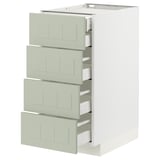 Un meuble de cuisine METOD blanc avec quatre tiroirs verts, offrant de nombreux rangements dans un design moderne et minimaliste.