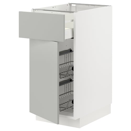 Armoire de cuisine blanche avec tiroir gris clair, grilles, design moderne.