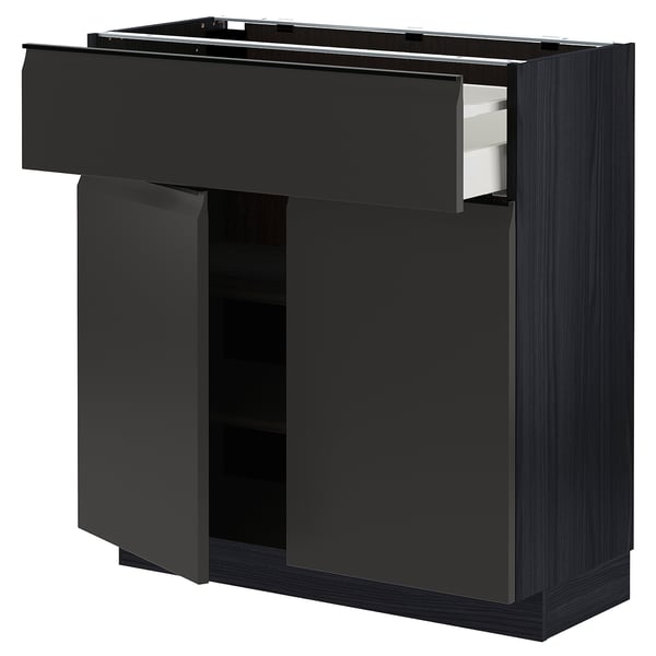 Armoire de cuisine noire avec tiroir et étagère, design moderne.