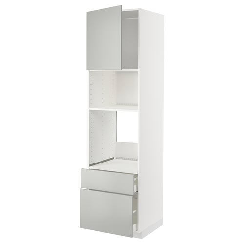Un meuble de cuisine METOD blanc avec des tiroirs et des étagères gris, doté d’un design moderne et épuré et de poignées en acier inoxydable.