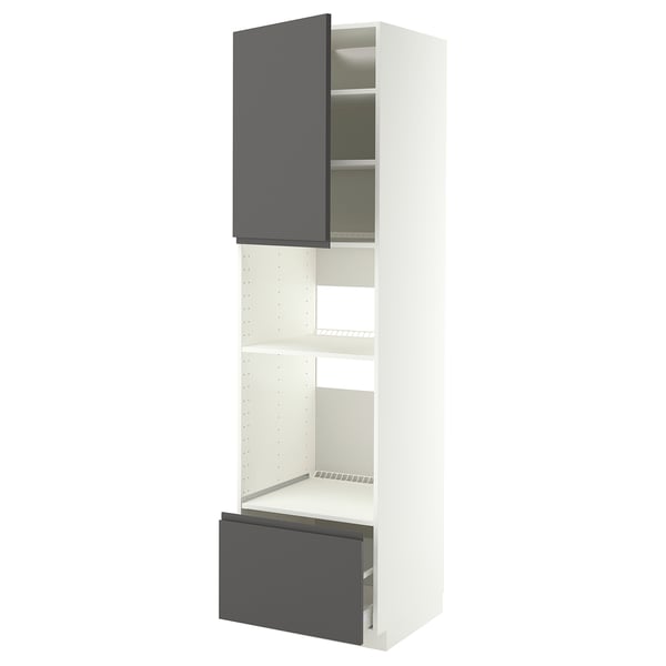 Armoire de cuisine moderne, blanche et grise, avec des poignées élégantes gris foncé. Haut, rectangulaire avec des étagères réglables et un tiroir escamotable.
