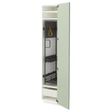 Une armoire de cuisine METOD verte avec organisateur, avec un tiroir et une étagère à l’intérieur.