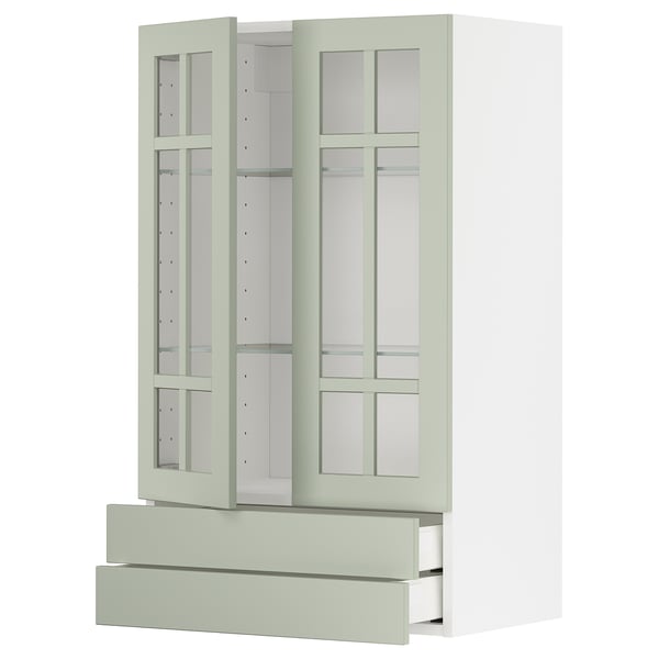 Meuble de cuisine METOD en vert avec portes, armoires et tiroirs en verre, fond blanc.
