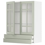 Set de cuisine METOD : portes en verre vert clair, armoires blanches, design moderne.