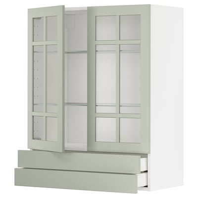 Set de cuisine METOD : portes en verre vert clair, armoires blanches, design moderne.
