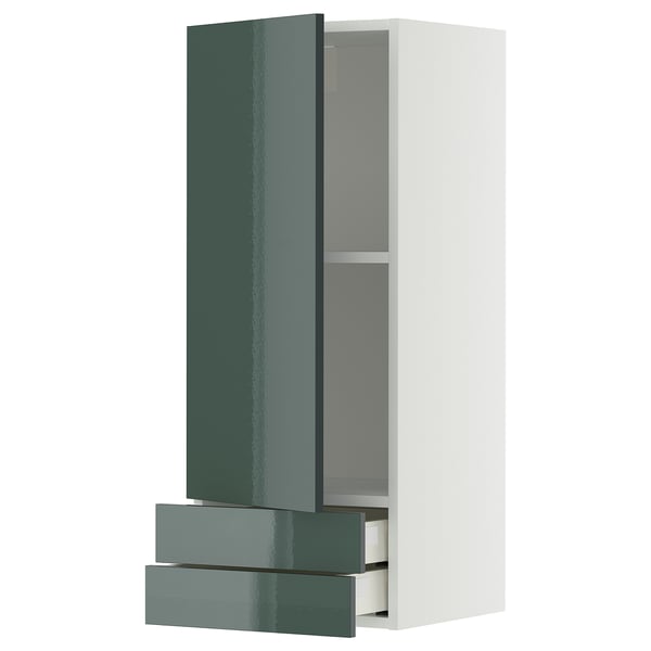 Armoire murale moderne vert brillant avec tiroirs coulissants.