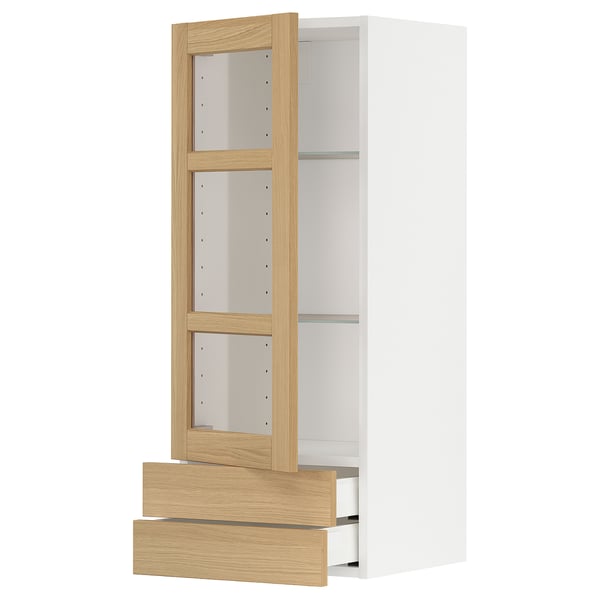 Armoire de cuisine blanche moderne avec tiroirs en chêne et étagère en verre, avec porte amovible.
