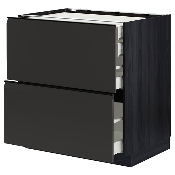 Armoire de cuisine noire moderne avec des poignées élégantes et deux grands tiroirs.