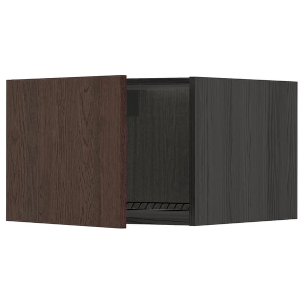 Armoire de cuisine en bois brun foncé avec porte ouverte unique, charnières métalliques.