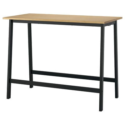 Une table de conférence haute MITTZON en noir et chêne. Il a un dessus rectangulaire avec des pieds en métal noir, offrant un support pour s’asseoir ou se tenir debout.