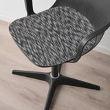 Chaise de bureau moderne avec assise texturée et rembourrée ; base noire robuste ; Parquet élégant.