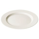Assiette blanche OFANTLINT, ronde, à bords nervurés, en porcelaine feldspathique.