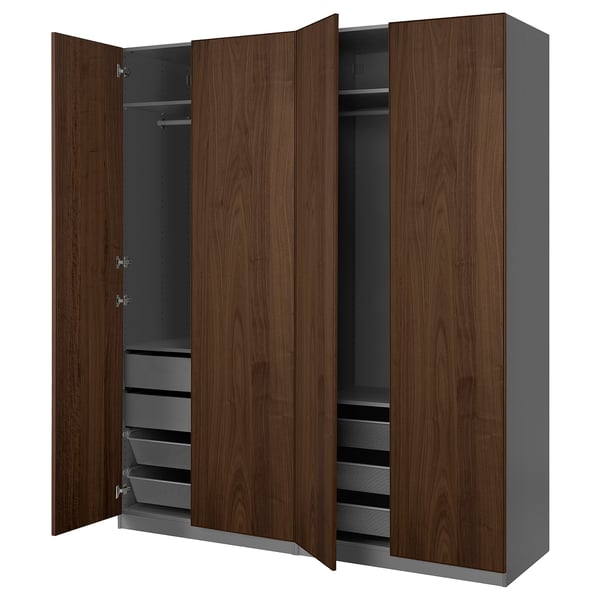 Une armoire ikea PAX brune foncée ouverte avec des étagères et des tiroirs.