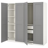 Armoire PAX grise, portes ouvertes montrant des étagères et des tiroirs, design moderne.