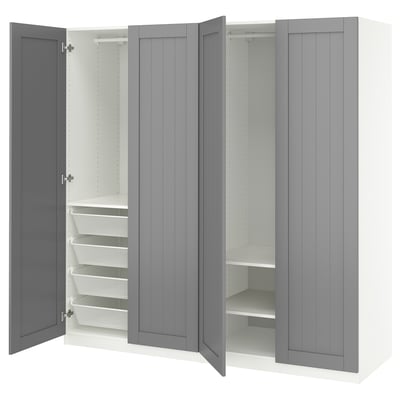 Armoire Ikea PAX, grise avec paniers et étagères en filet.